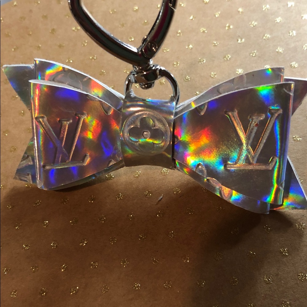 Handmade holographic bow w/ silver clasp